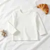 Mono para Bebés Niños y Niñas 2026 Primavera y Otoño Elegante Versátil Top de Manga Larga y Mono de Mezclilla Conjunto de Dos Piezas Moderno