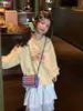 Moletom Infantil Flower and Xun para Meninas 2026 Primavera Estampa Barbie Macio e Amigo da Pele Solto Casual Versátil Top