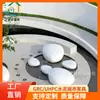 Nueva piedra charm fábrica suministro directo piedra UHPC imitación flor de piedra taburete para piscina terrazo blanco taburete de cemento curvo asiento GRC
