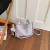 Bolsas de mano de diseñador únicas para mujer, nueva bolsa cruzada vintage verano 2026, comercio exterior transfronterizo, bolsa de cadena de albóndiga de alta gama