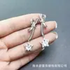 Brincos de pino estrela cadente femininos agulha de prata Alto senso 2023 novo design de nicho de luxo leve brincos frios estrela de cinco pontas