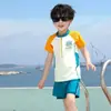 Traje de baño para niños Niños 2024 Nuevo Verano Manga Larga Pantalones Divididos Protección Solar Niños Equipo de Natación para Aguas Termales