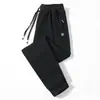 Pantalones largos finos de seda helada de verano para hombre, pantalones deportivos holgados de secado rápido para hombre, talla grande, con puño, pantalones casuales modernos para hombre