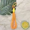 Llavero con tema de dopamina con cordón trenzado, diseño colorido y minimalista, adecuado para teléfonos y llaves de coche, un accesorio elegante con un toque de lujo