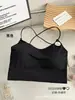 Sujetador sexy de seda helada sin espalda con copas, camisola versátil para usar como prenda exterior, top básico de tirantes de color liso de una sola pieza