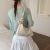 Bolso de axila de moda retro, simple y fresco, elegante bolso bandolera tipo dumpling, versión coreana de cuero encerado al aceite, bolso de hombro de moda de comercio exterior