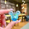 Llavero de Botella de Arena Movediza con Cabeza de Mickey de Dibujos Animados Flotando en Líquido de Aceite Pequeño Regalo al por Mayor Colgante para Mochila Escolar Hebilla de Llave
