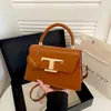 Bolso de mano texturizado estilo coreano para mujer, nuevo y moderno 2026, moda simple, hebilla de cierre, bolso de hombro casual, bolso cruzado