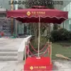 Fábrica de Shenzhen paraguas grande parasol exterior soporte de seguridad paraguas Propiedad de imagen paraguas romano resistente al viento paraguas protector de puerta