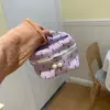 Bolso de mano bordado de nicho nuevo con gran capacidad de almacenamiento, neceser en colores de caramelo, bolso pequeño, neceser
