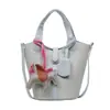 Bolsa Pequena de Textura de Luxo para Mulheres Verão 2025 Novo Estilo Versátil Bolsa de Ombro/Axila Popular Bolsa Saco Transversal