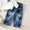Conjunto de Dos Piezas para Niñas Otoño Cuello Polo Lazo Manga Larga Estampado Completo Decoración de Lazo Tridimensional Jeans Venta al por Mayor