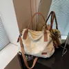 Bolso Grande de Color Contrastante Relajado Transfronterizo para Mujer 2025 Nueva Moda Bolso Tote Imitación Mezclilla Bolso de Hombro Único Cruzado Otoño e Invierno