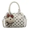 Bolso Boston de color de bloque de lunares de nicho transfronterizo para mujer, nuevo bolso de hombro y cruzado informal con textura para el verano de 2026