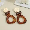 Pendientes vintage bohemios versátiles europeos y americanos transfronterizos para mujer, tachuelas de estilo degradado de resina empalmada geométricas retro