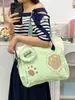 Bolsa de lona multi-color con estampado de pata de oso suave y linda, bolso de mano y bandolera de doble uso, bolsa escolar de gran capacidad para estudiantes