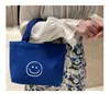 Bolsa de Lienzo con Cara Sonriente Ins Estilo Simple Bolsa Tote Bolsa para el Almuerzo Bolsa Cuadrada Pequeña Portátil Bolsa Casual para Mujer