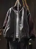 Chaqueta de Cuero Patchwork Colección Otoño 2026 Estilo Coreano Cuello Alto Nicho Puntadas de Contraste Diseño Casual con Sentido Chaqueta