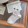 Nuevos calcetines de tubo de algodón fino para primavera y verano 2025 con bordado de cachorro lindo estilo académico para niños