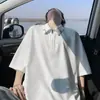 Camisa polo de verano con botones metálicos, tejido gofrado, media cremallera, camiseta de manga corta holgada para hombre, estilo old money