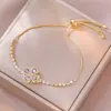 Collar para Mujer, Estilo Influencer Transfronterizo Flor de Girasol Circonita Giratorio Conjunto de Tres Piezas Decoración Collar de Acero de Titanio