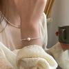 Collar de dos perlas de plata rota con diseño de nicho, cadena de clavícula de perlas de plata rota para mujer, nuevo nicho de lujo ligero (2023)