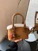 Bolso de axila estilo retro transfronterizo, de alta gama para mujer, nueva colección 2026, gran capacidad, se puede llevar en la mano, usar como bolso de hombro o como bolso cruzado, estilo bolso cubo