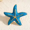 Conjunto de três peças de brinco, anel e broche de estrela-do-mar e concha com estilo oceânico e efeito de gota de óleo, acessórios multicoloridos com bordas douradas vintage estilo férias