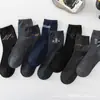Calcetines Big Foot calcetines de vestir para hombre otoño e invierno nuevos calcetines de media pantorrilla calcetines casuales para adultos al por mayor en stock entrega