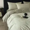 Conjunto de cama jacquard de algodão puro 60s de fibra longa de Xinjiang, tecido grosso, quatro peças, com toque de luxo leve, incluindo capa de edredom e lençol de baixo