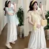 Verano 2026 Nuevo Estilo Cuello Redondo Mangas Abullonadas Lazo Babydoll Camisa Top de Maternidad + Falda de Encaje Conjunto de Maternidad
