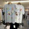 2026 Verano Nuevo Estilo Coreano para Mujer Holgado Casual Diseño Estampado de Dibujos Animados Adornado Tridimensionalmente Top de Moda Tendencia