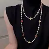 Collar de perlas vintage en capas, sensación de lujo ligero y alta gama, cadena versátil para suéter, accesorio de ropa popular de nicho para mujer