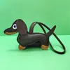 Al por mayor En stock Colgante de Perro Dachshund Accesorios Pequeños de Cuero Encantos Lindos de Dibujos Animados para Bolsos Llavero de Cuero de Dibujos Animados