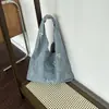 2026 Verano Nuevo Bolso Cubo Casual de Mezclilla Bolso de Hombro de Moda y Único Tendencia Diseño de Nicho Bolso para Mujer