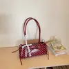Bolso de axila de nicho de moda para mujer 2026 Nuevo de verano Moda Bolso de hombro de lunares rojos Bolso versátil para el día a día