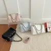 Bordado de almohada estilo coreano 2026 nueva tendencia de moda patrón de diamante simple bolso cruzado casual para el día a día