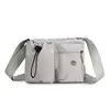 Bolso de hombro de nailon nuevo 2026 para mujer, bandolera simple y casual, gran capacidad, versátil para ir al trabajo y con estilo deportivo.