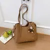 Bolso tote diario de color liso transfronterizo, bolso de gran capacidad de moda para mujer, nuevo estilo Otoño 2026, bolso de hombro único a la moda para ir al trabajo