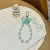 Nuevo Colgante de Mariposa Colorida Flor con Cuentas Llavero Decoración para Funda de Auriculares de Niña Adorno Colgante Colorido Venta al por Mayor