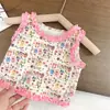 Nuevo conjunto de verano elegante y a la moda para niños: top rosa floral sin mangas y pantalones anchos con volantes en el bajo para exportación