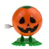 Novidade Divertido Mola de corda Mola de corda Bola que pula Basquete Futebol Bola de olho grande Truque Halloween Presente Brinquedo