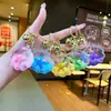Llavero de Estrella de Cinco Puntas Acrílica con Concha de Estrella de Mar Rellena de Aceite y Arena Líquida Colgante para Mochila Decoración de Llavero Estrella Venta al por Mayor