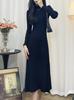 Vestido de punto negro de otoño e invierno, vestido suéter de punto de manga larga, ajuste ceñido, cuello alto medio