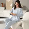 Pijama popular de comercio exterior para mujer, traje de pantalón largo de manga larga para primavera y otoño, ropa de casa simple y elegante para mujer, venta al por mayor