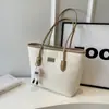 Nova bolsa tote grande estilosa com blocos de cor 2026 para mulheres, moderna para escola, trabalho e uso diário, bolsa de ombro, bolsa de axila, transfronteiriça