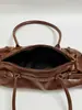 Bolso de hombro minimalista de nicho estilo coreano Shuai Mi Jia para mujer, nuevo modelo de moda otoño 2026, bolso baguette para debajo del brazo