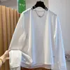 Elegante camiseta branca de manga longa para mulheres, novo estilo 2026, solta e moderna, blusa base falsa de duas peças para mulheres A13561