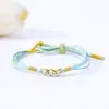 Directamente del fabricante: Pulsera de Cuerda Colorida con Nudo de Flor de Durazno Tejida a Mano, Material Premium, Unisex, Pulsera Protectora