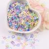 Estrellas huecas sirena flor de cerezo maquillaje de escenario infantil brillo lentejuelas diy material pegamento funda de teléfono móvil lentejuelas 10g